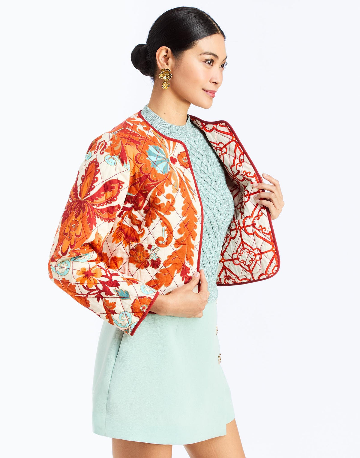 Side - Este Quilted Jacket in Calypso Waltz is a reversible quilted cotton jacket with piping and patch pockets.
