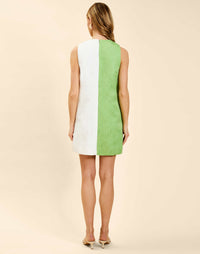 Mini A-line shift dress with scalloped faux button detailing, sleeveless tonal jacquard dress with pockets and back zipper.