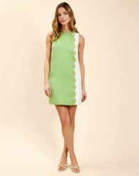 Mini A-line shift dress with scalloped faux button detailing, sleeveless tonal jacquard dress with pockets and back zipper.