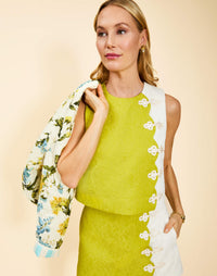 Etta Top in Citrus Ivory cotton jacquard with scalloped detailing, novelty frog ties, sleeveless silhouette, and crew neckline.