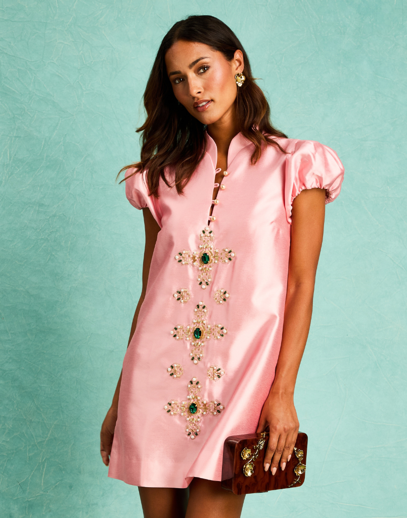 Elliana Mini Dress in Blush Tulip with a mandarin collar, pleated puff sleeves, and beading down the front.
