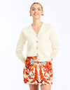 Front - Finley Cardigan in Ivory is an oversized knit cardigan with embroidery and gold buttons.