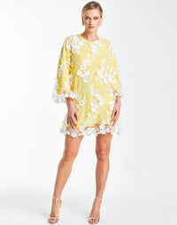 A-line mini dress in canary yellow, crafted in white floral 3D lace