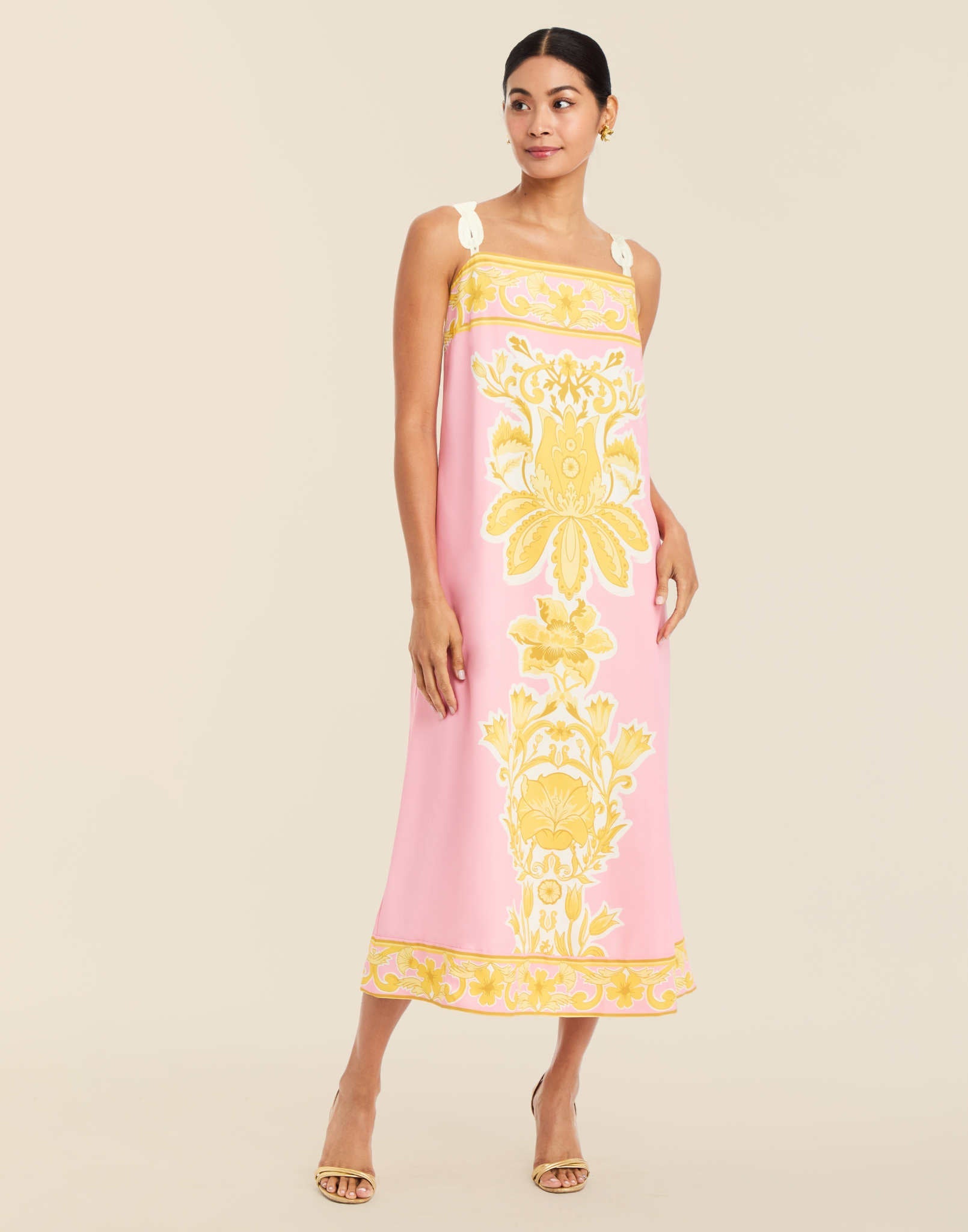 Galena Convertible Tea Length Dress in Florentine Lattice linen with reversible floral and lattice prints, rope straps, and side pockets.