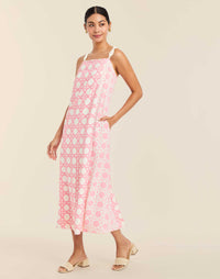 Galena Convertible Tea Length Dress in Florentine Lattice linen with reversible floral and lattice prints, rope straps, and side pockets.