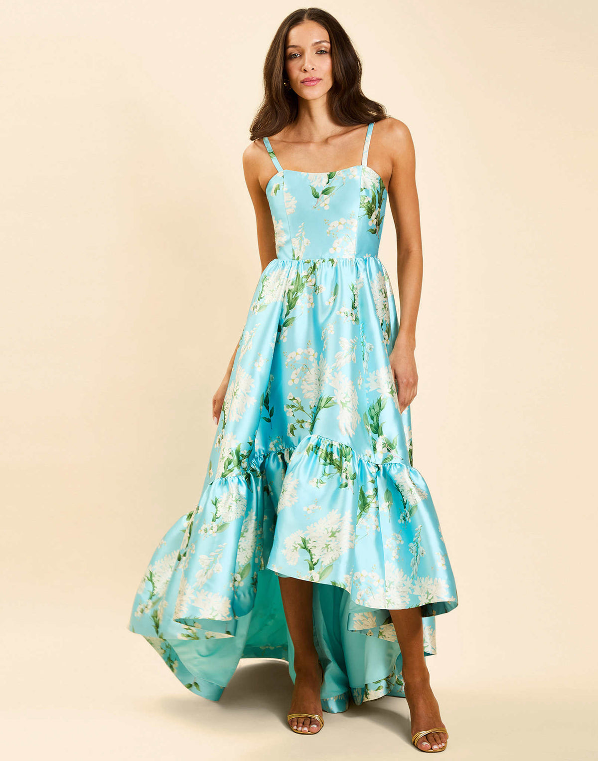 Georgiana Gown in Blue Botanica strapless poly silk twill gown with asymmetrical cascading skirt and side seam pockets.