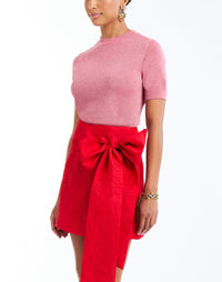 Granada Wrapped Mini Skirt in Rose Red side – cocktail mini wrap skirt with bow-tie waist, concealed zipper, and full lining by Mestiza New York.