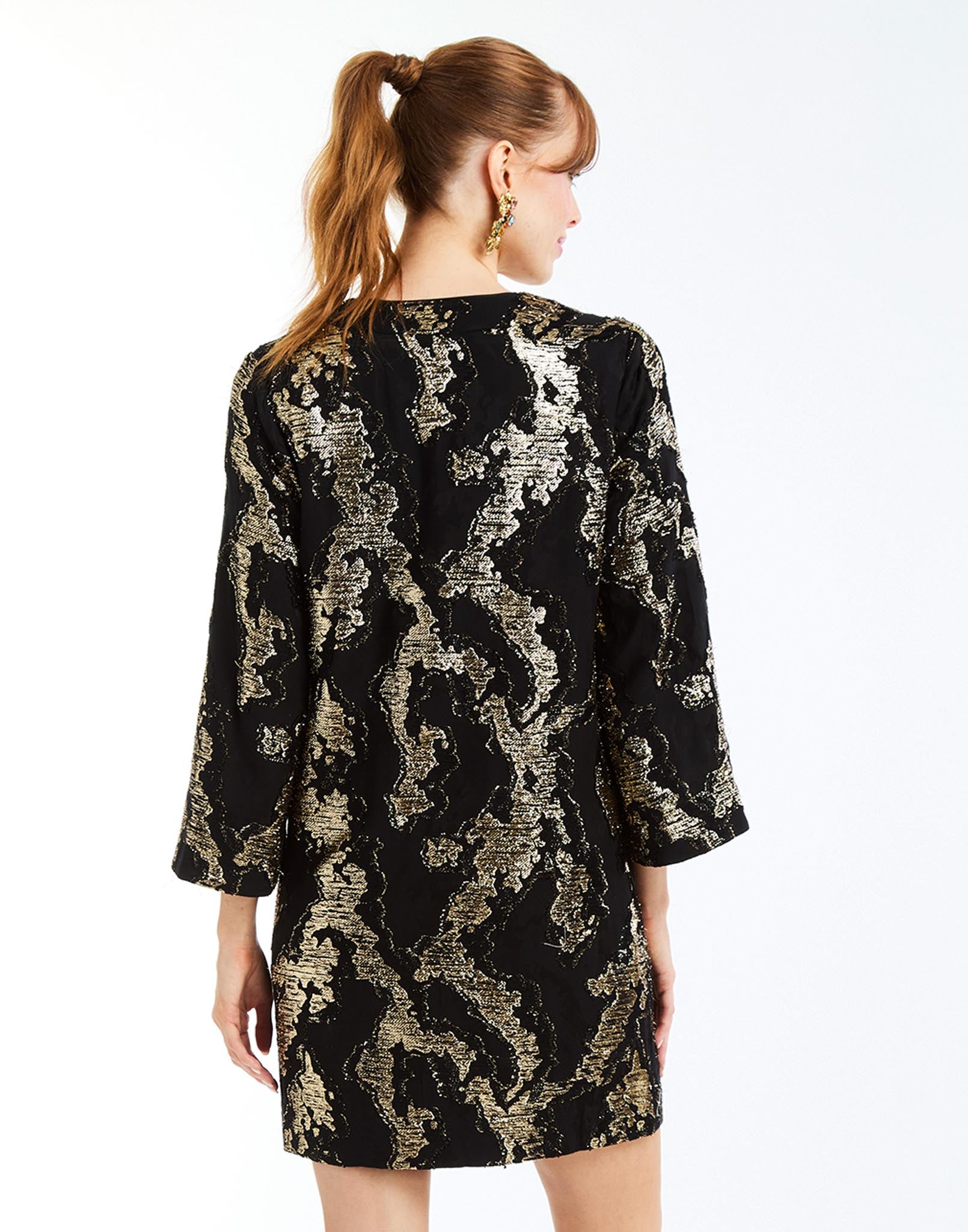 Ines Caftan Mini Dress in Black/Gold back – metallic lurex cocktail shift dress with djellaba collar, bell sleeves, and side seam pockets by Mestiza New York.