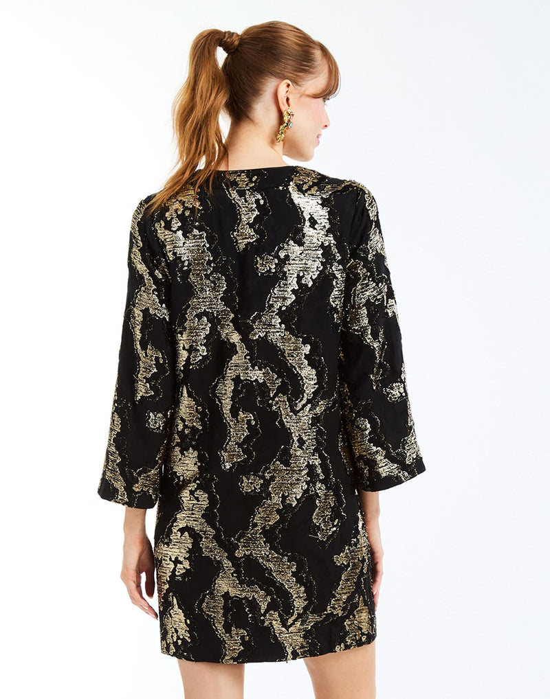 Ines Caftan Mini Dress in Black/Gold back – metallic lurex cocktail shift dress with djellaba collar, bell sleeves, and side seam pockets by Mestiza New York.