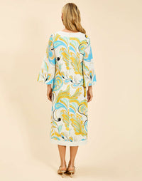 Ines Midi Caftan in Marble Rhapsody with Djellaba-style neckline, relaxed sleeves, side slits, and functional hand pockets.