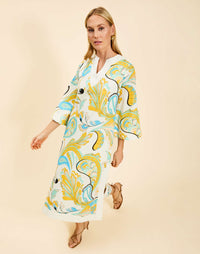 Ines Midi Caftan in Marble Rhapsody with Djellaba-style neckline, relaxed sleeves, side slits, and functional hand pockets.