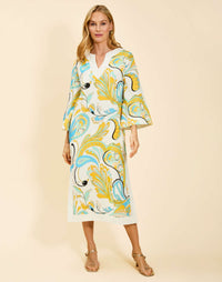 Ines Midi Caftan in Marble Rhapsody with Djellaba-style neckline, relaxed sleeves, side slits, and functional hand pockets.