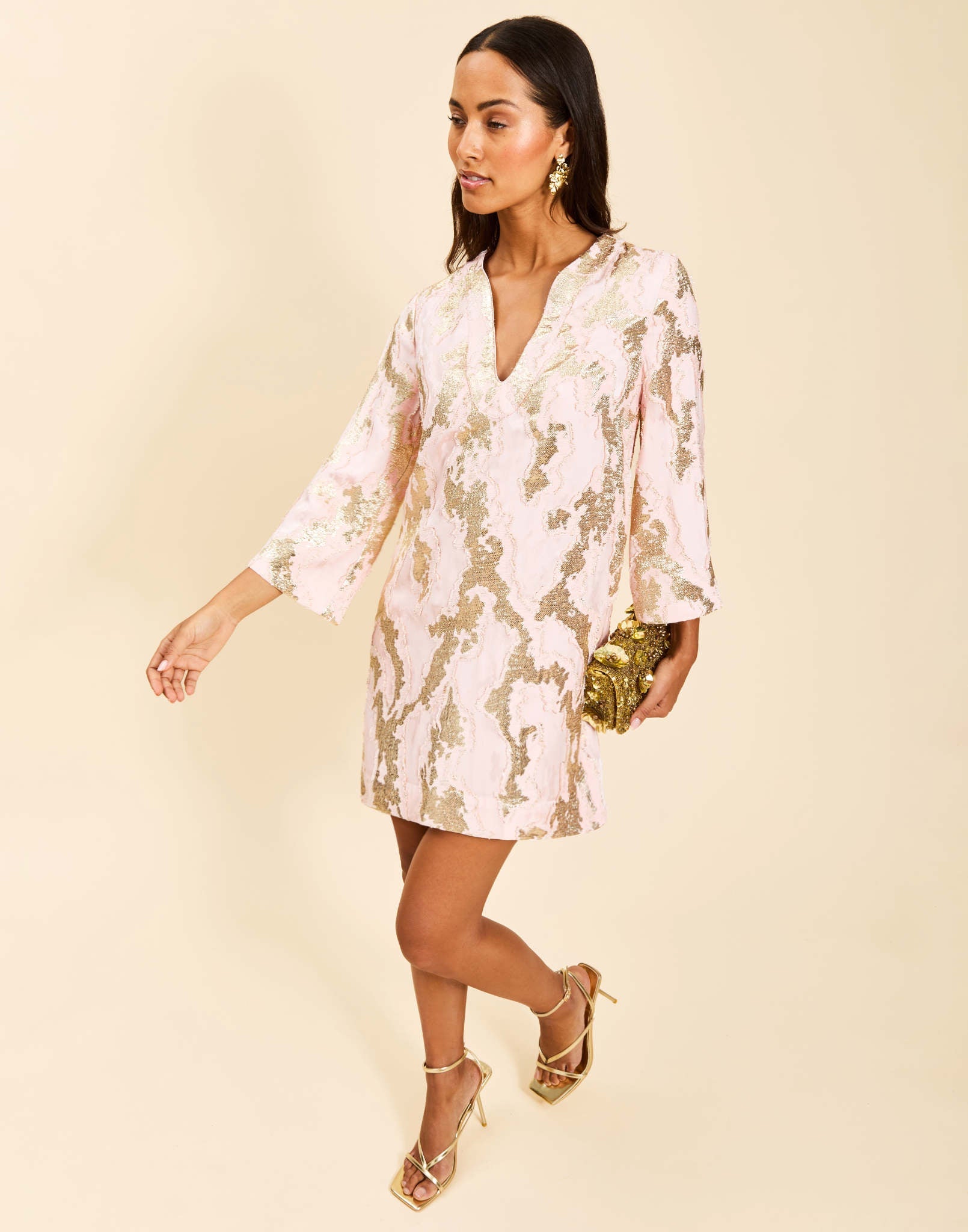 Ines Caftan Mini Dress in Blush Gold metallic jacquard with djellaba-style collar, bracelet sleeves, and side pockets.