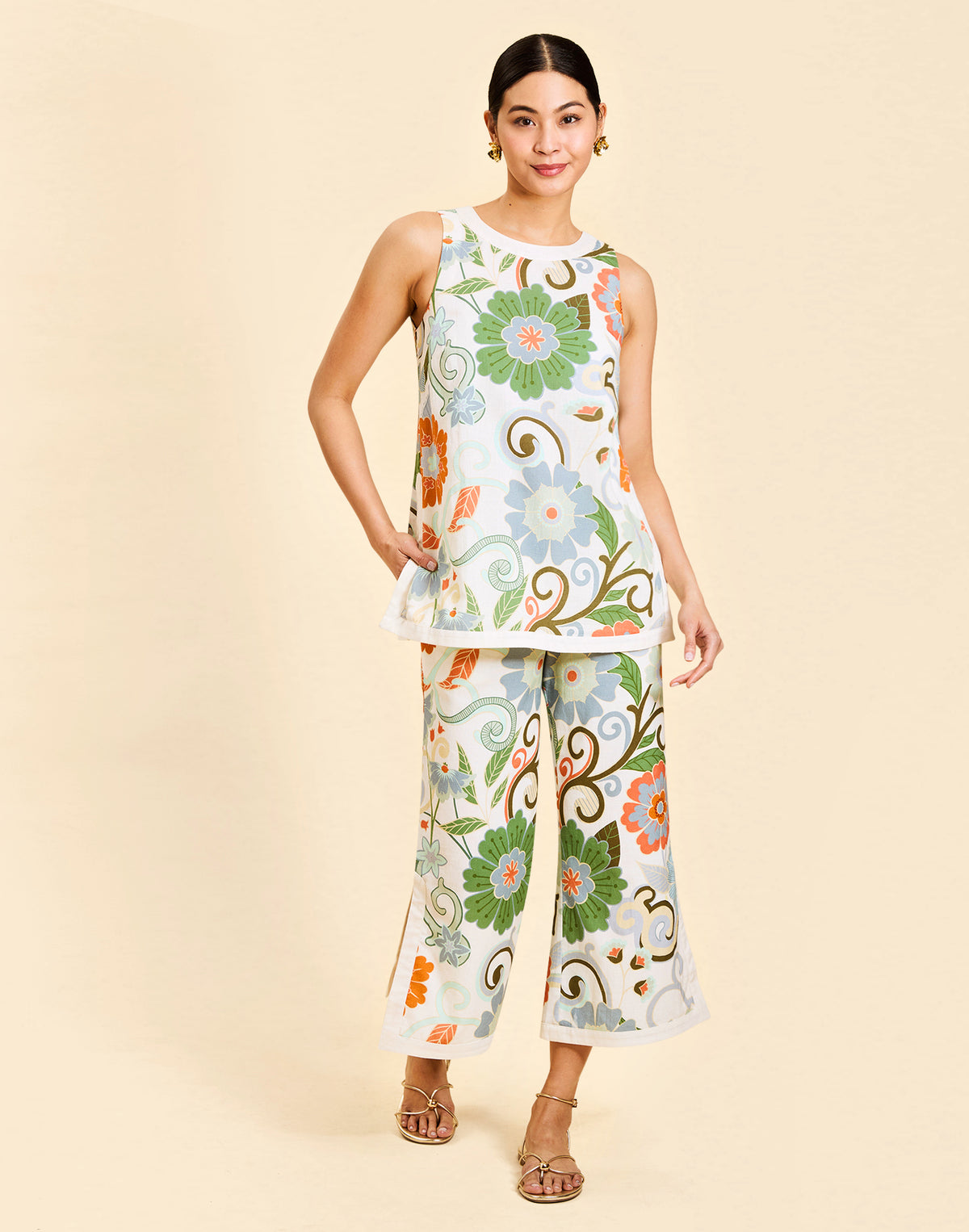 Judah Cropped Pant in Groovy Florals linen with high waist, ivory banding, cropped length, and tailored silhouette.