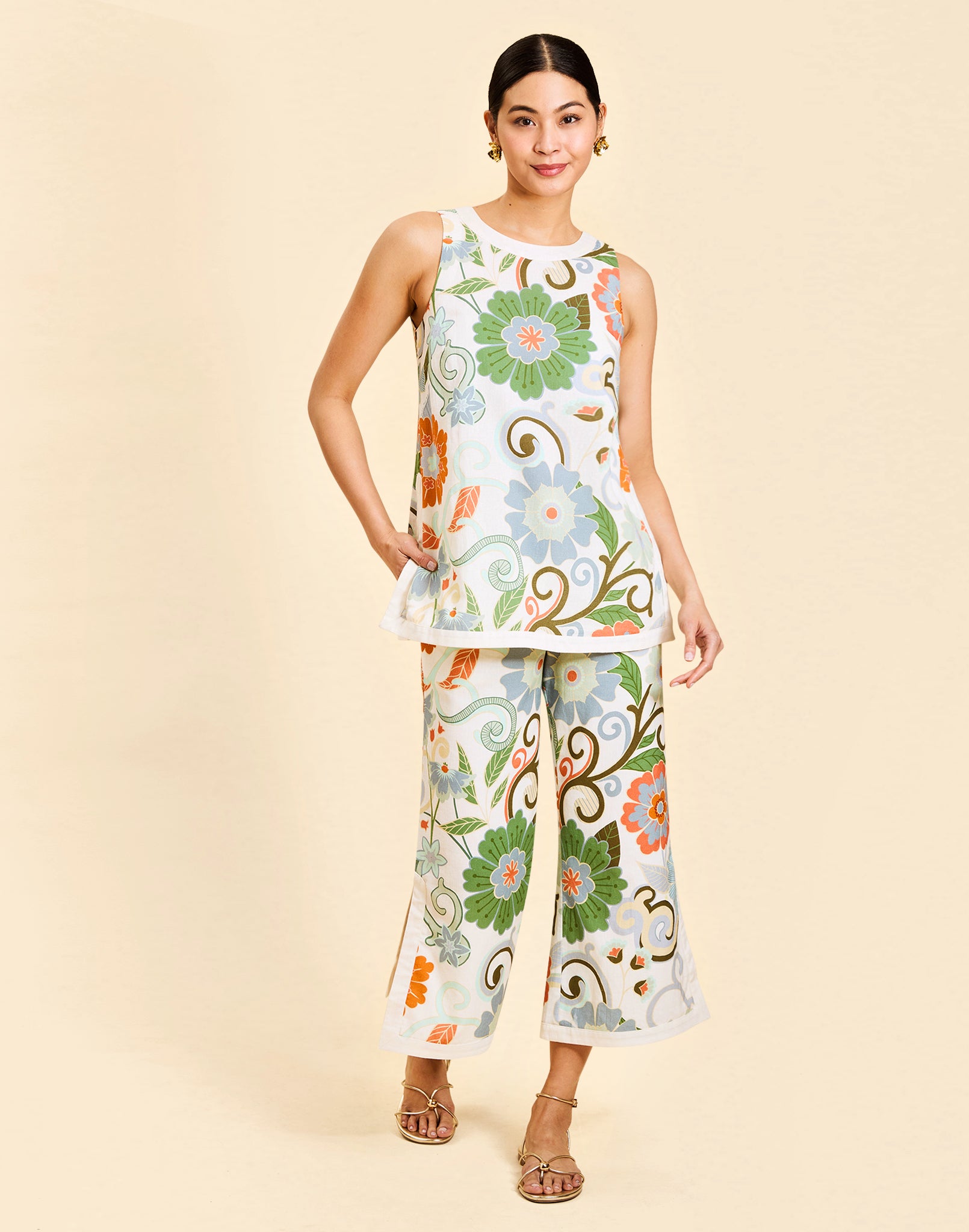 Judah Cropped Pant in Groovy Florals linen with high waist, ivory banding, cropped length, and tailored silhouette.