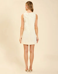 Juniper Shift Mini Dress in Ivory cotton poplin with 3D floral embroidered appliqué, sleeveless shift silhouette, crew neckline, and hidden pockets.