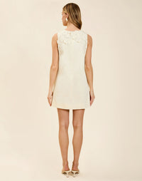 Juniper Shift Mini Dress in Ivory cotton poplin with 3D floral embroidered appliqué, sleeveless shift silhouette, crew neckline, and hidden pockets.