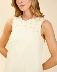 Juniper Shift Mini Dress in Ivory cotton poplin with 3D floral embroidered appliqué, sleeveless shift silhouette, crew neckline, and hidden pockets.
