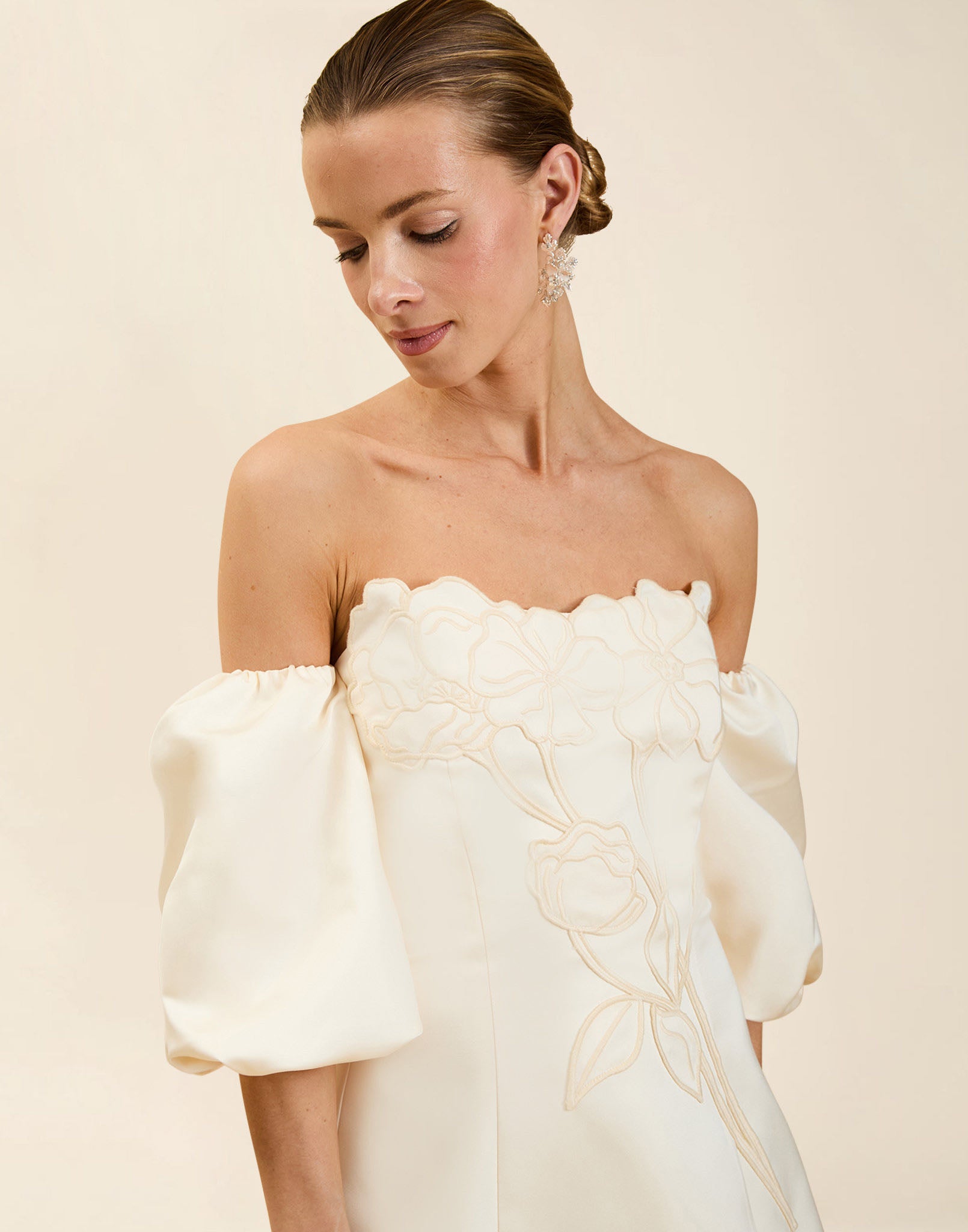 Liezel Convertible Mini Dress in Ivory taffeta with tonal floral embroidery, removable balloon sleeves, and detachable Watteau-style train.