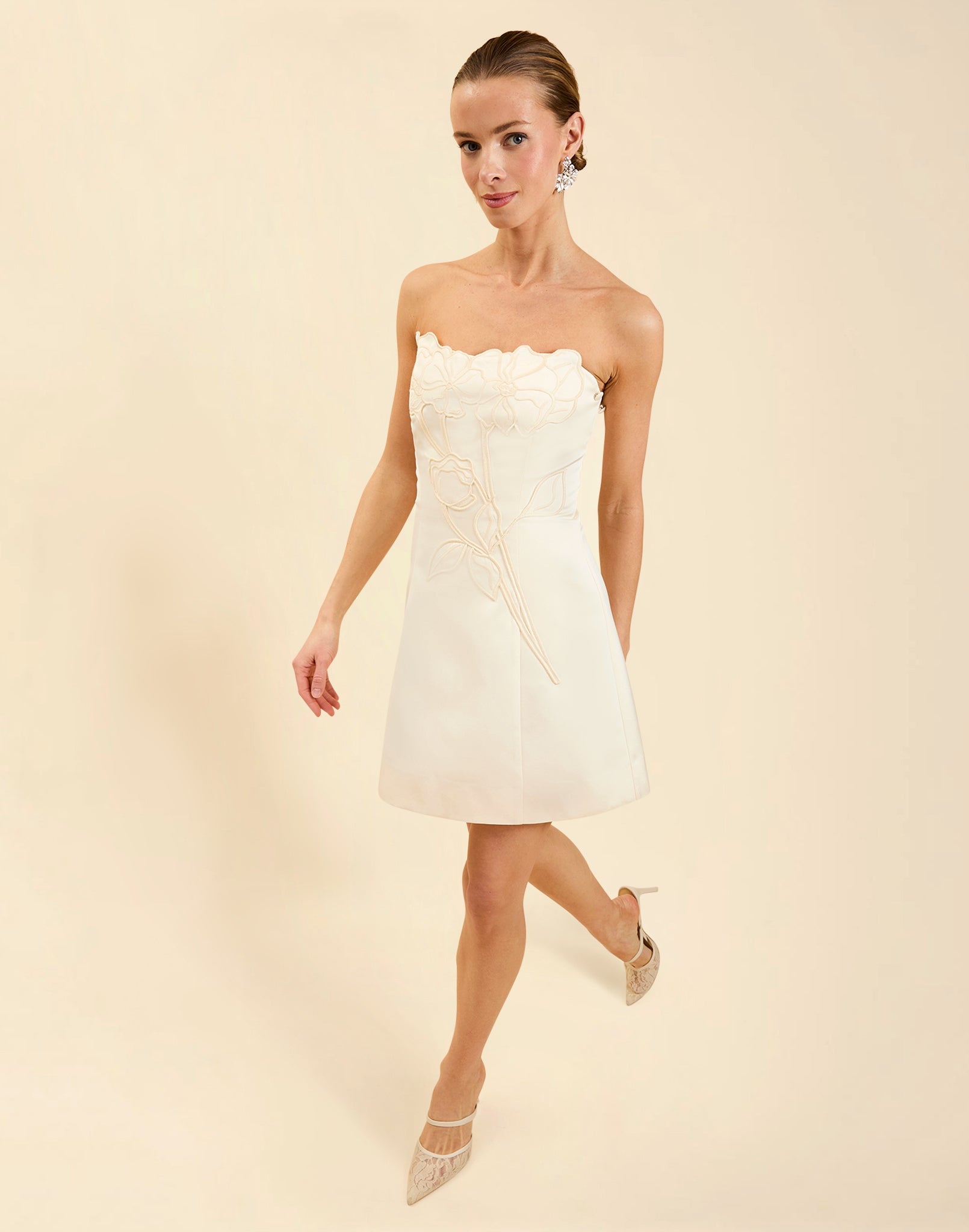 Liezel Convertible Mini Dress in Ivory taffeta with tonal floral embroidery, removable balloon sleeves, and detachable Watteau-style train.
