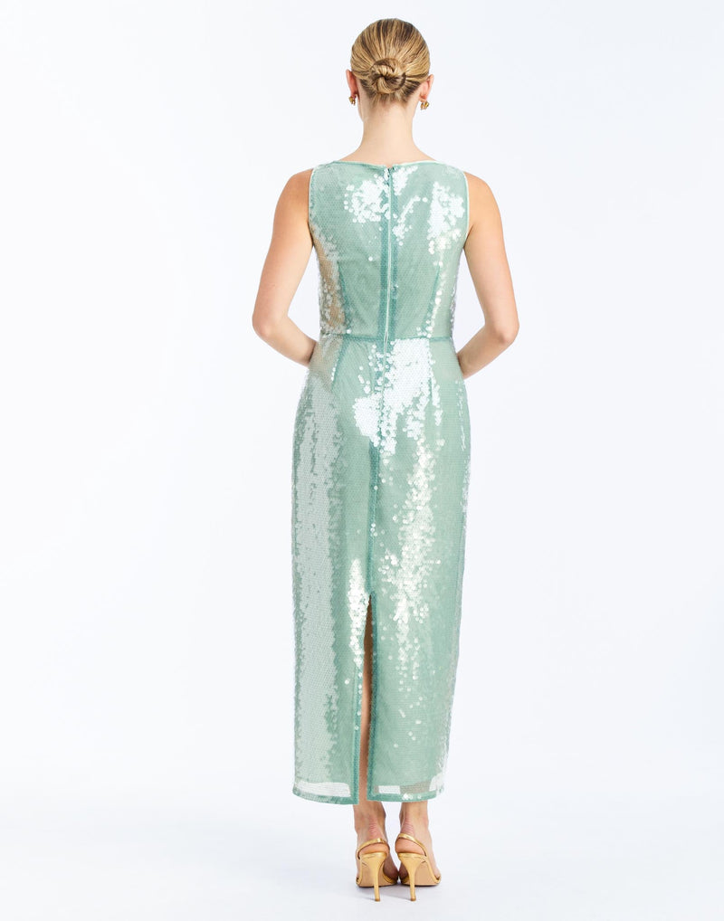 Back - Lillian Convertible Gown in Aquarelle Blue is a sequin column gown with removable cape and bow details.