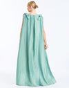 Back - Lillian Convertible Gown in Aquarelle Blue is a sequin column gown with removable cape and bow details.
