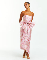 Strapless midi dress in pink metallic jacquard with removable bow belt. 