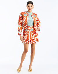 front - Mallory Mini Skirt in Rossa Waltz is an A-line printed mini skirt with waistband and pockets