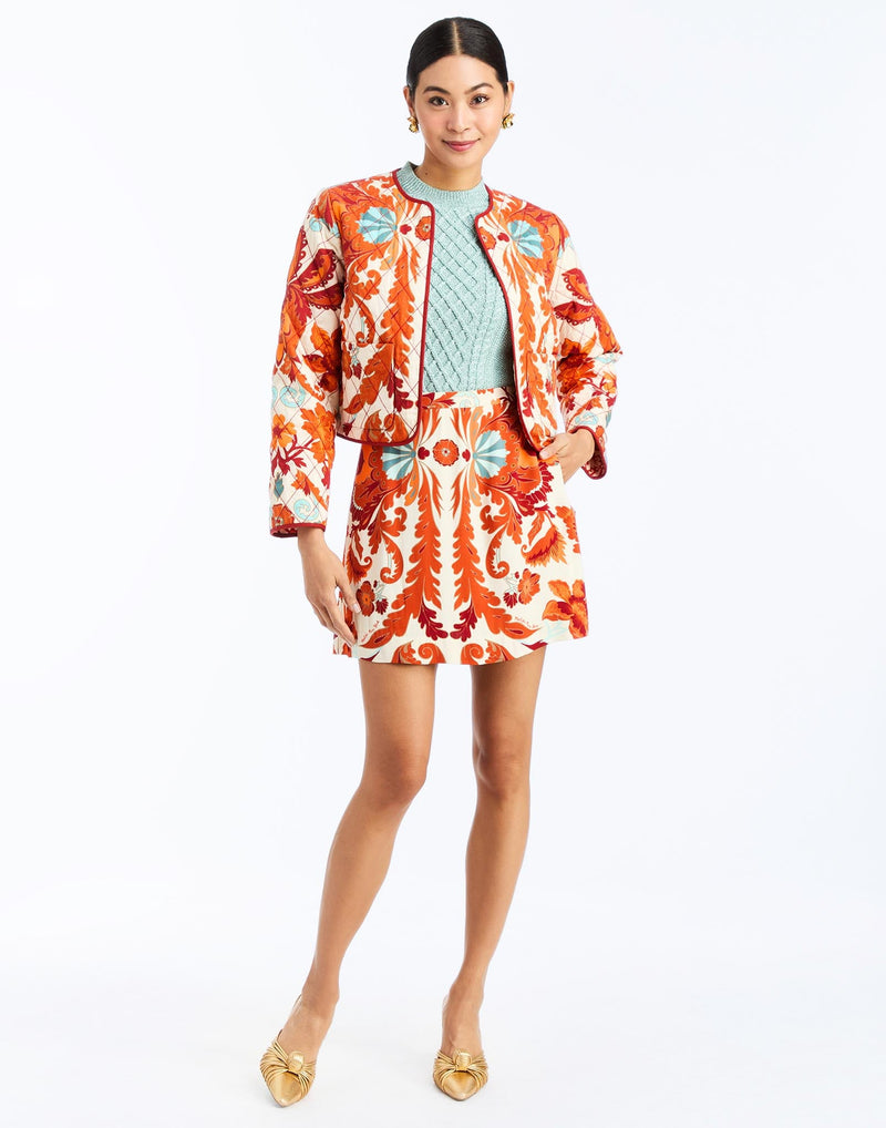 front - Mallory Mini Skirt in Rossa Waltz is an A-line printed mini skirt with waistband and pockets