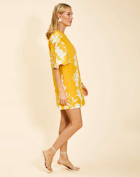 Marianna Shift Mini Dress in Huckleberry Yellow poplin with scalloped elbow-length sleeves, ruffle detail, and shift silhouette.