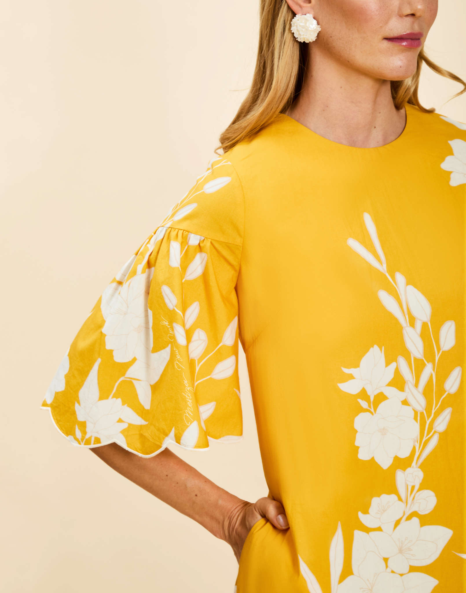 Marianna Shift Mini Dress in Huckleberry Yellow poplin with scalloped elbow-length sleeves, ruffle detail, and shift silhouette.