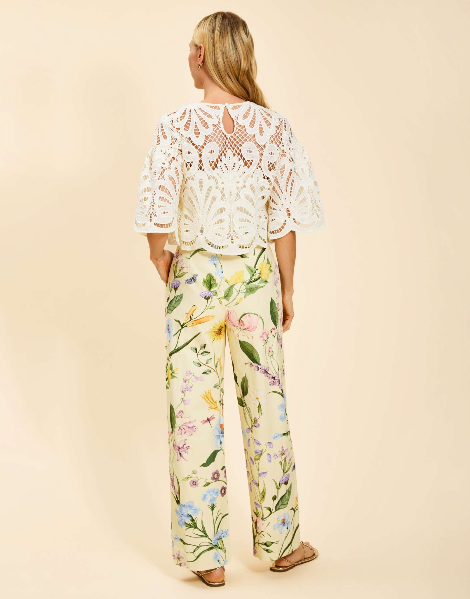 Antonella Pants in Blooming Vine canvas with high-waisted fit, straight-leg silhouette, slash side pockets, and concealed side zipper.