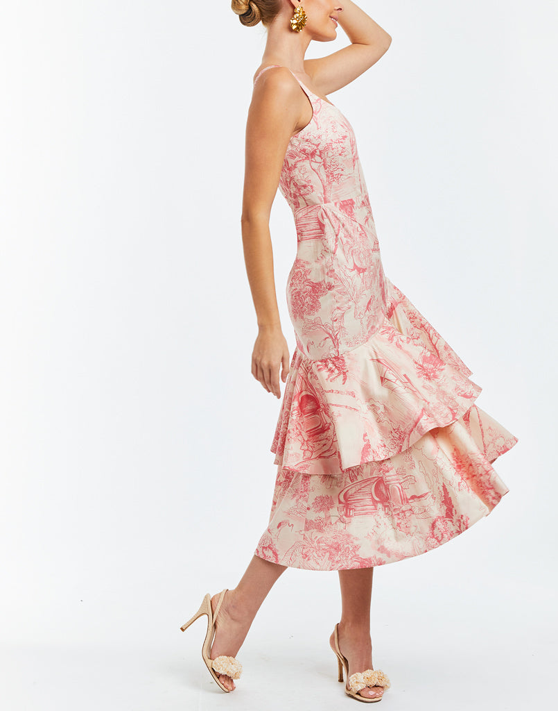 Convertible gown in heavy cotton sateen with removable bottom tier to make a midi dress. Whimsical pink toile print. Fitted bodice and boning in princess seams. 