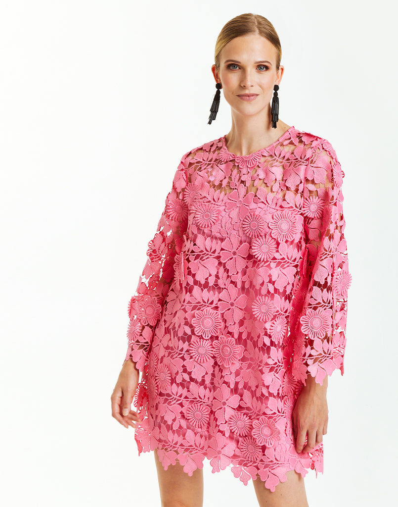 Pink Mod-style floral lace mini dress with sleeves.
