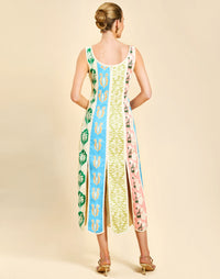 Monte Carlo Midi Dress in Beach Bazaar linen with scoop neckline, sleeveless silhouette, and bias panel skirt detail.