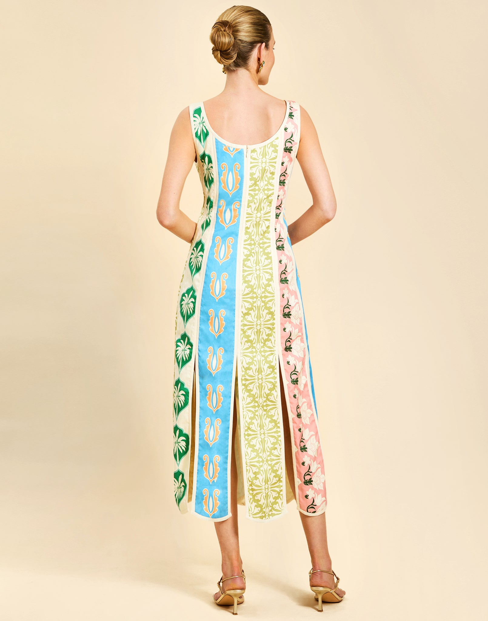 Monte Carlo Midi Dress in Beach Bazaar linen with scoop neckline, sleeveless silhouette, and bias panel skirt detail.
