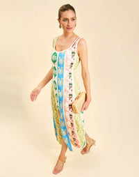 Monte Carlo Midi Dress in Beach Bazaar linen with scoop neckline, sleeveless silhouette, and bias panel skirt detail.