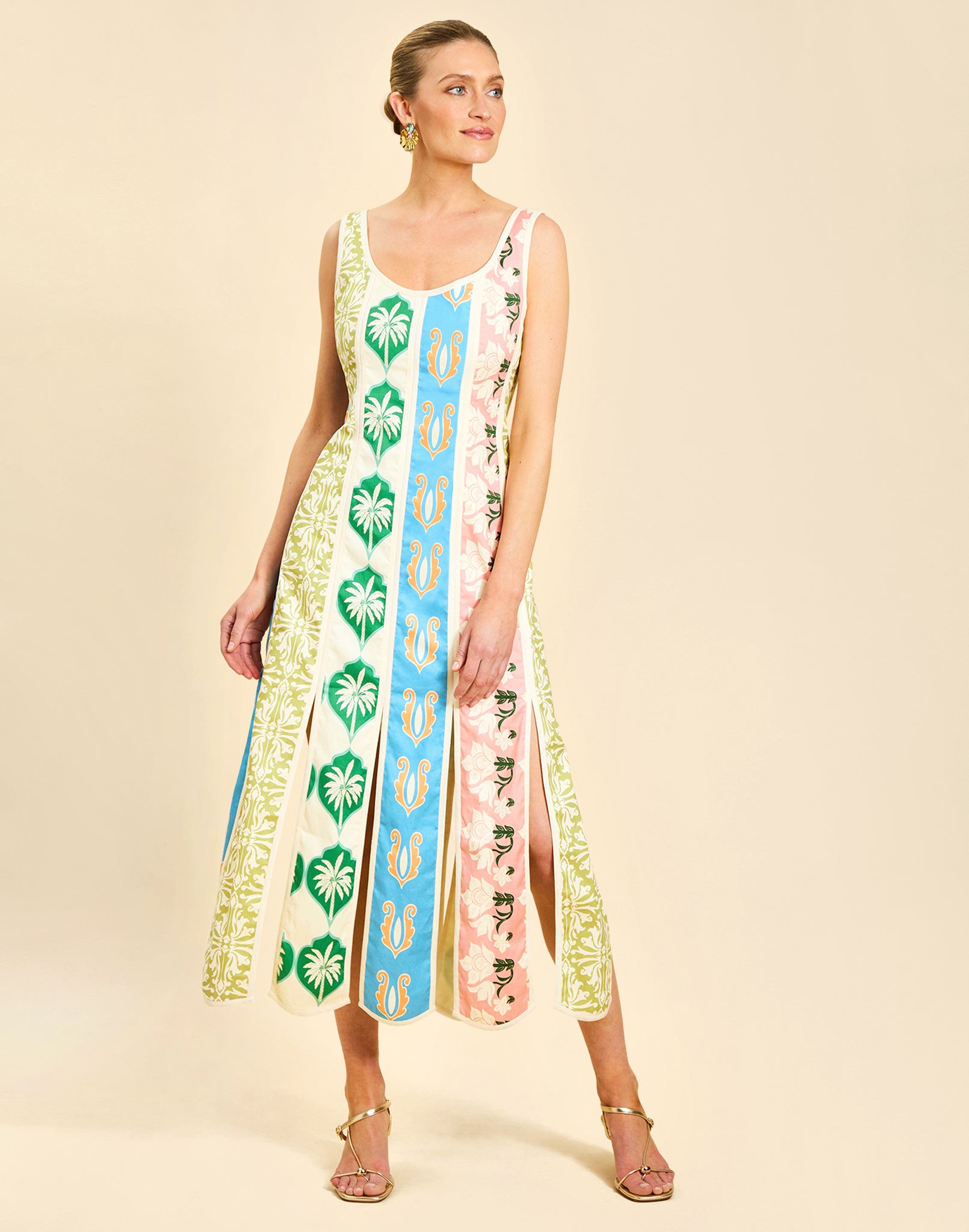 Monte Carlo Midi Dress in Beach Bazaar linen with scoop neckline, sleeveless silhouette, and bias panel skirt detail.