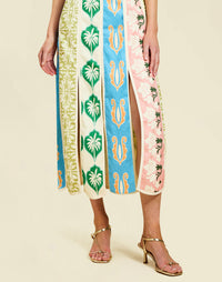 Monte Carlo Midi Dress in Beach Bazaar linen with scoop neckline, sleeveless silhouette, and bias panel skirt detail.