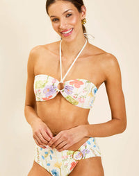 Model wearing Mykonos Halter Bikini Top in Garden Muse with ruched front detail and gold hardware.