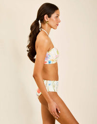 Model wearing Mykonos Halter Bikini Top in Garden Muse with ruched front detail and gold hardware.