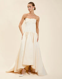 Nereida Dropwaist Gown in Ivory taffeta with strapless neckline, tonal floral embroidery, drop-waist silhouette, and high-low skirt with train.