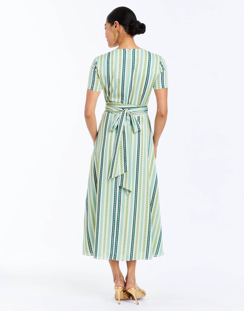Back - Nolita Wrap Dress in Catena Stripe cocktail midi with faux wrap waist, gold hardware, and short sleeves.