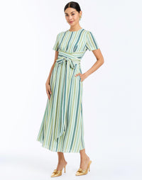 Side - Nolita Wrap Dress in Catena Stripe cocktail midi with faux wrap waist, gold hardware, and short sleeves.