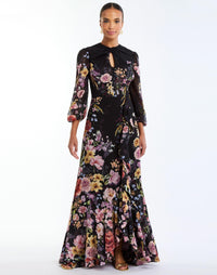 Ophelia Chiffon Gown in Twilight Florals front – chiffon evening gown with twisted keyhole neckline, sheer balloon sleeves, and cascading ruffle skirt by Mestiza New York.