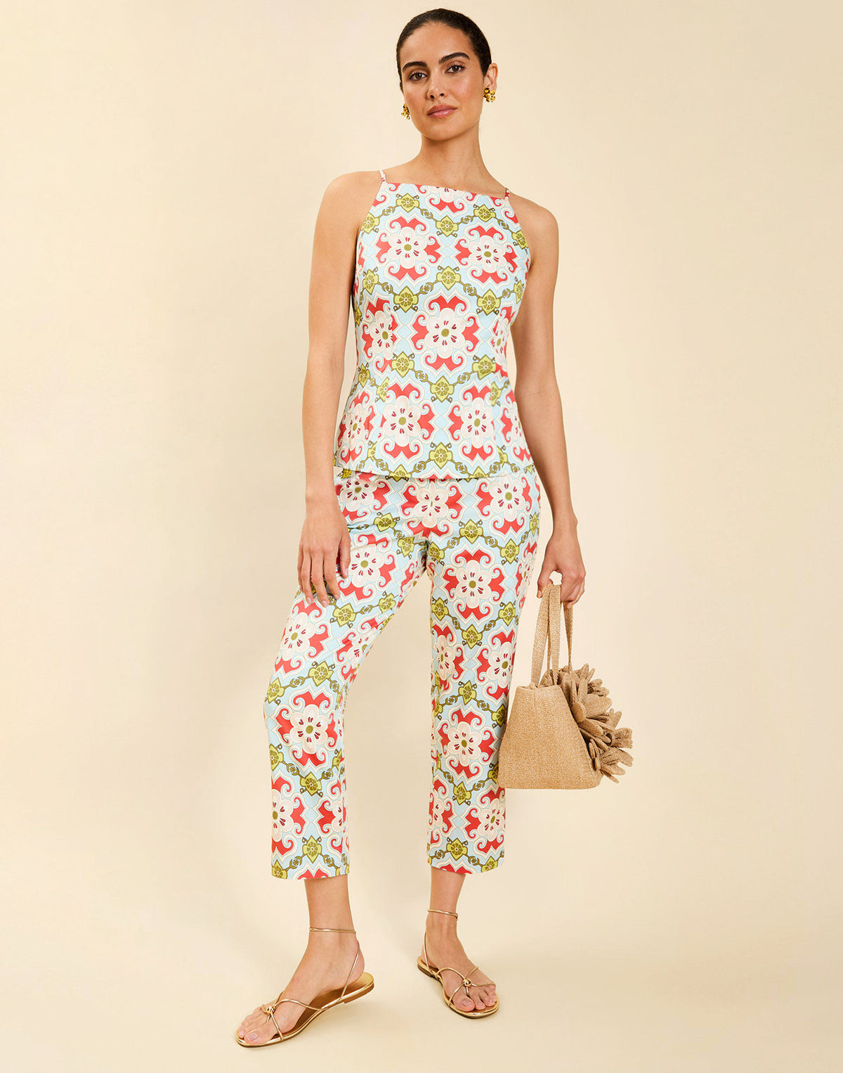 Model wearing the Palau Cigarette Pant in Quatrefoil Sierra print, featuring a slim-fit cropped silhouette, tailored front pleat detailing, side seam pockets, and crisp poplin fabrication.