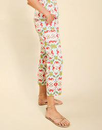 Model wearing the Palau Cigarette Pant in Quatrefoil Sierra print, featuring a slim-fit cropped silhouette, tailored front pleat detailing, side seam pockets, and crisp poplin fabrication.