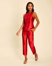 Palau Cigarette Pant in Merlot Red with a high waist, pressed front pleats, and cropped slim-fit silhouette