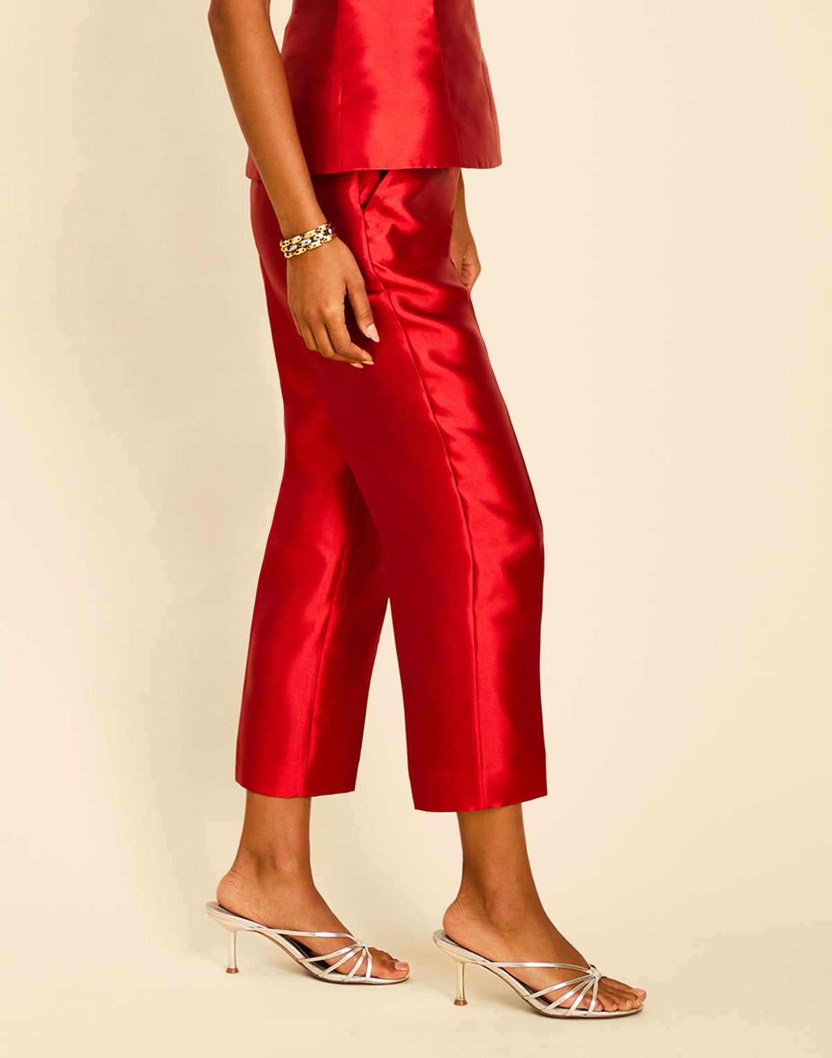 Palau Cigarette Pant in Merlot Red with a high waist, pressed front pleats, and cropped slim-fit silhouette