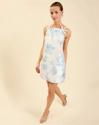 Payton Mini Dress in Powder Batiste poly dupioni with straight neckline, bow strap details, shift mini silhouette, and hidden side pockets.